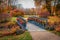 Blooming flowers on old bridge in Muskau Park, UNESCO World Heritage Site.