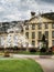 Blooming Orangerie park in Strasbourg. Magnolias, tulips, roses. Double exposure. Postcard