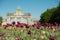 Blooming pretty tulips at Jubilee Park in Brussels. Triumphal Arch on the background