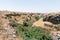 Blooming  valley with a river flowing from the Ayit waterfall on the Golan Heights in Israel