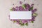 Blossom Syringa vulgaris in Lilac flower and blank paper card for text message.Top view. Romantic flowers composition. Mock up