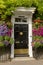 Blossoming flowers and georgian entrance, Henley on Thames