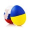 Blow to Orthodoxy: two Easter eggs painted in color of the flags of Russia and Ukraine isolated on white background