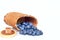 Bluberries in bark basket on a white background