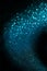 Blue abstract glitter trail background made of defocused lights