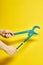 Blue Adjustable wrench isolated on yellow background