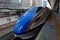 Blue aerodynamic train on the platform