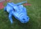 Blue Alligator made from Fabric on Green Grass