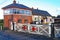 BLUE ANCHOR, SOMERSET, ENGLAND - NOVEMBER 11TH 2012: The signal box and level crossing gates at Blue Anchor station on the West