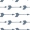 Blue arrows seamless pattern on white background. Doodle style. Tribal wallpaper
