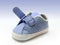 Blue baby shoe with open velcro strap, isolated, clipping path included.