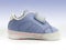 Blue baby shoe with open velcro strap, isolated, clipping path included.