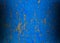 Blue background abstract with rusted paint