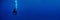 Blue background banner with a scuba diver entering water in a vertical position making bubbles