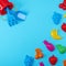 Blue background with childrens colorful toys