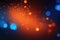 A blue background with orange defocused sparkle. ai generative