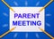 On a blue background, white paper clips, yellow pencils and a white sheet of paper with the text PARENT MEETING