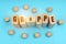 On a blue background, wooden cubes and Jenga with the inscription - Grippe