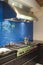 Blue Backsplash And Stainless Steel Vent Hood