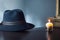 Blue bailey hat and candle on wooden table, light blue background with Generative AI