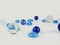 Blue balls on white background, abstract background scattered glass balls
