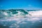 Blue barrel wave in ocean. Big wave for surfing in Kuta