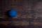 Blue Basketball On old Hardwood Court Floor With Spot Lighting