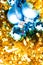 Blue bauble on golden decoration