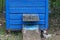 Blue beehive in the forest on summer.