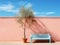 a blue bench and a potted plant next to a pink wall