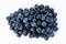 Blue berries on a white background. Fresh delicacy, top view.