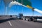 Blue big rig semi truck with day cab and flat bed semi trailer d