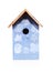 Blue birdhouse painted by children