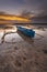 The blue boat and dusk are beautiful