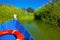 Blue boat sailing in Albufera lake of Valencia