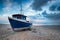 Blue Boat on a Shingle Beach