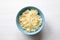 Blue bowl of fermented cabbage from above