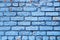 Blue Brick Wall with peeling paint background texture