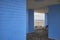 Blue brick walled shelter with bench at Coney Island