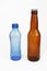 Blue and brown glass beverage a bottles