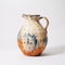 Blue And Brown Speckled Earthenware Jug With Raw And Unpolished Finish