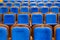 Blue brown wooden chairs in the auditorium. Without people