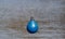 BLue buoy hanging out to dry