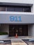 Blue Business Building with a Large 911 Blue Numbers on The Front