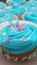 Blue Buttercream Frosting Cupcakes with Sprinkles