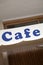 Blue Cafe Sign