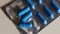 Blue capsules so close, health care object