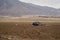 Blue car buried under the earth after a flood in ChaÃ±aral, Chile