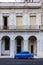 Blue car and old buldings in Havana, Cuba