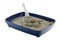 Blue cat litter tray with clumping litter and scoop